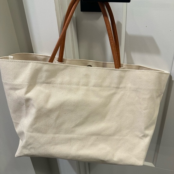 Elegant Cream Tote Bag with Tan Handles - Picture 2 of 7